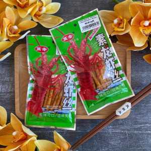 Соевая закуска SU LONG XIA SI со вкусом запечёного лобстера с пряностями 24гр (20шт в блоке) (зел)
